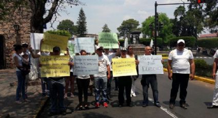 Familiares de policías heridos en Arantepacua marchan en Morelia 