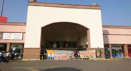 CNTE bloquea centros comerciales y prende fuego a neumáticos en Oaxaca