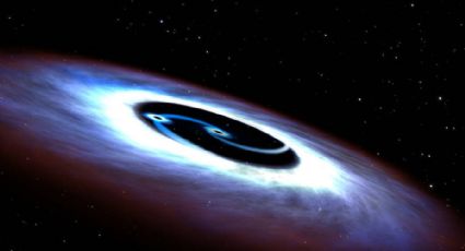 Encuentran una docena de agujeros negros en el centro de la Vía Láctea