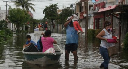 Ayuda INM a damnificados por lluvias en Tabasco