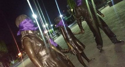 Estatuas y monumentos amanecen con símbolos feministas
