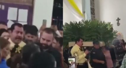 'El Tucán', líder criminal, lleva mañanitas a la Virgen; policías le cargan arreglo floral | VIDEO