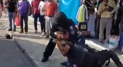Policías someten a joven albañil por negarse a una revisión en Cancún: Video