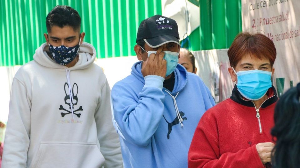 Personas con cubrebocas por la pandemia de Covid-19.