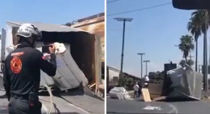 Choca tren con tráiler y lo parte en dos en Escobedo