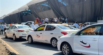 Caos en el AICM: Taxistas bloquean Terminal 1 y 2 por conflicto con Uber y Didi
