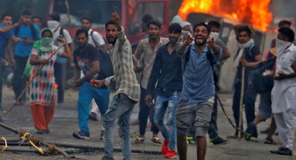 Protestas por condena de violación a líder espiritual en India deja al menos 14 muertos