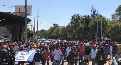 Migrantes centroamericanos marchan hacia instalaciones de la ONU