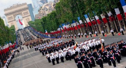 Francia celebra su día nacional con incidentes en desfile militar