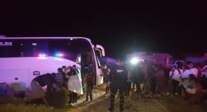 Encuentran autobús con 56 migrantes en Alvarado, Veracruz