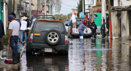 Dos semanas inundados en Cholula, Ocoyoacac; afectados bloquean la México-Toluca