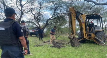 Suman 14 cadáveres en fosas en Villamar, Michoacán