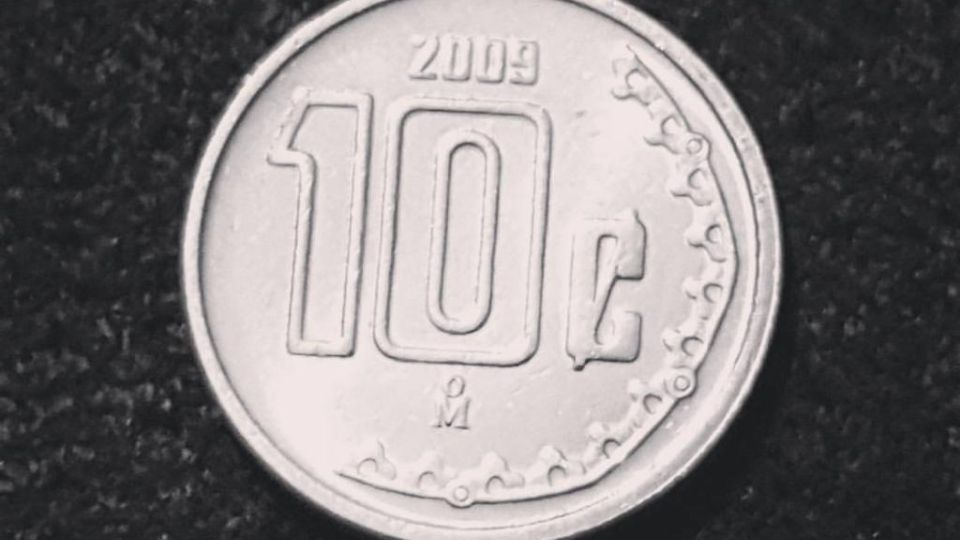 La moneda de 10 centavos.