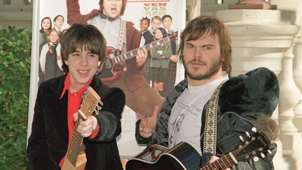 Jack Black, protagonista de la película 'Escuela de rock', junto al actor Joey Gaydos jr., durante la presentación del film en 2004.