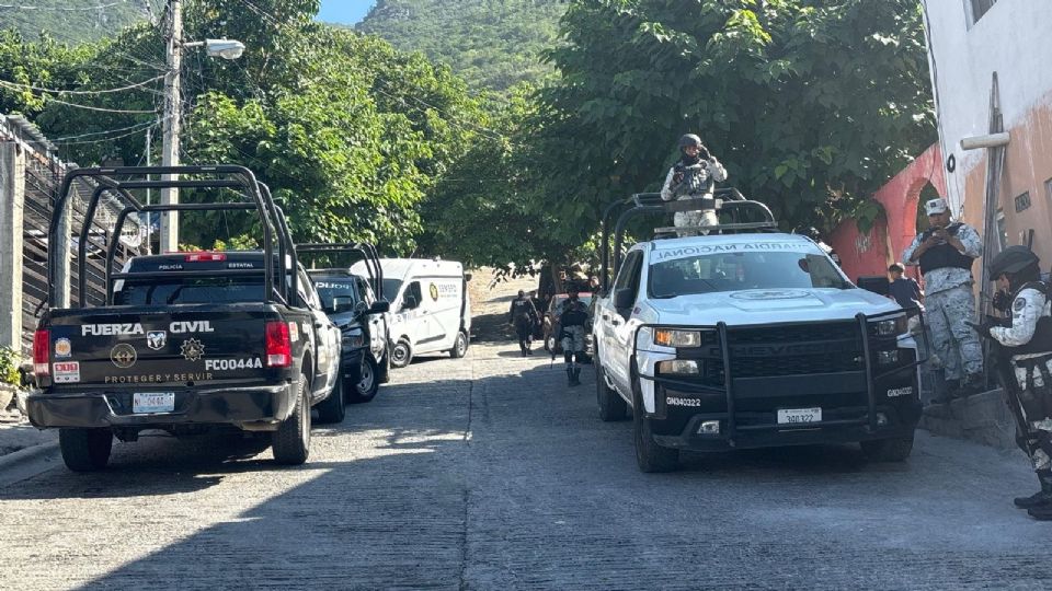 Elementos de Fuerza Civil y la Guardia Nacional acordonaron la zona donde fueron localizados los restos humanos.