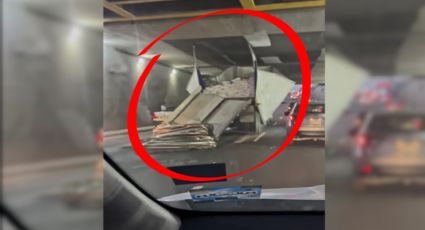 Tráiler queda atorado en puente deprimido de Ruiz Cortines