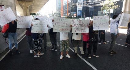 Retiran protesta de ambientalistas en Periférico Norte; piden retiro de anuncio envolvente