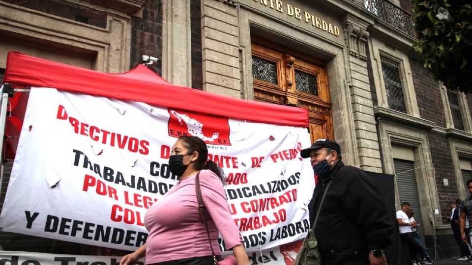 Acuerdan levantar huelga en Nacional Monte de Piedad.