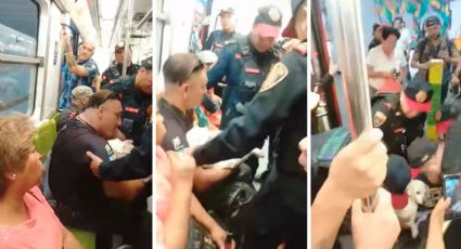 Policías de CDMX desalojan del Metro a hombre con perrito herido