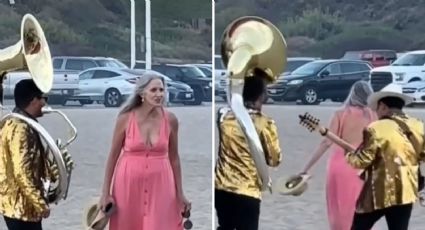 Critican a extranjera en playa de Sinaloa por callar a músicos de banda