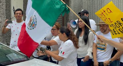 Ministra de la Suprema Corte, Loretta Ortiz Ahlf ofrece conferencia en medio de protestas