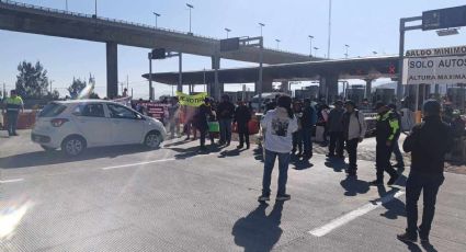 Vecinos de Topilejo cierran intermitentemente casetas de cobro en la México- Cuernavaca