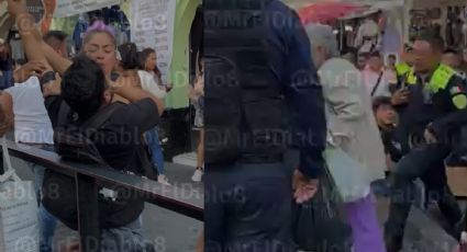 Les dan golpiza en CDMX por intentar cambiar un pantalón; policías no intervienen