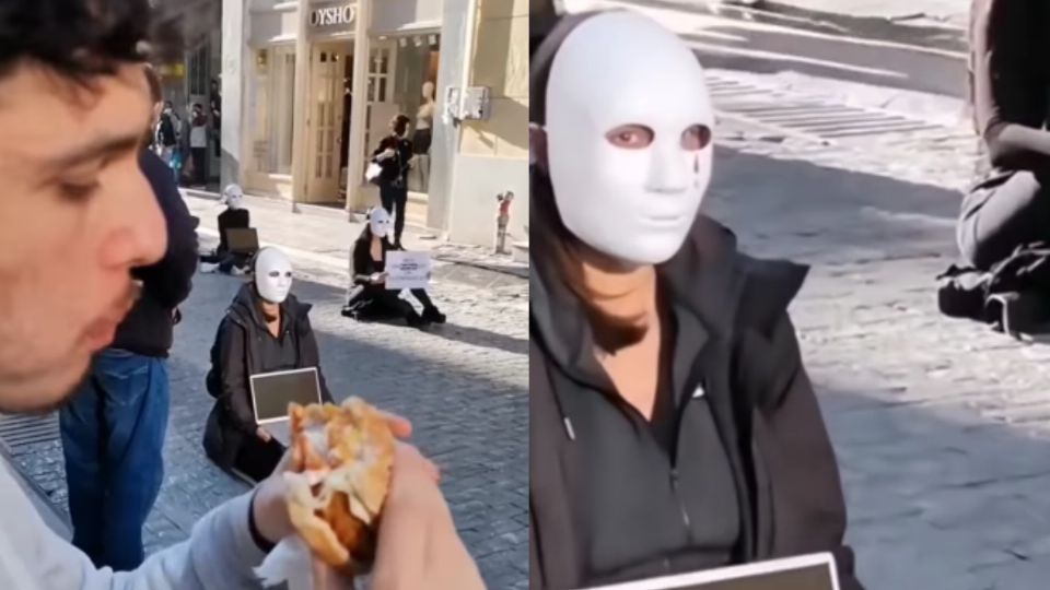 Manifestantes veganas fueron sorprendidas por este chico, que comió delante de ellas una hamburguesa de pollo.