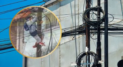 VIDEO | A plena luz del día captan a delincuente robándose los cables de un poste en Edomex