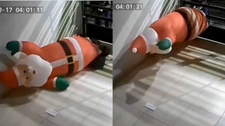 VIDEO | Roban inflable de Santa Claus entre los barrotes de un portón en Puebla