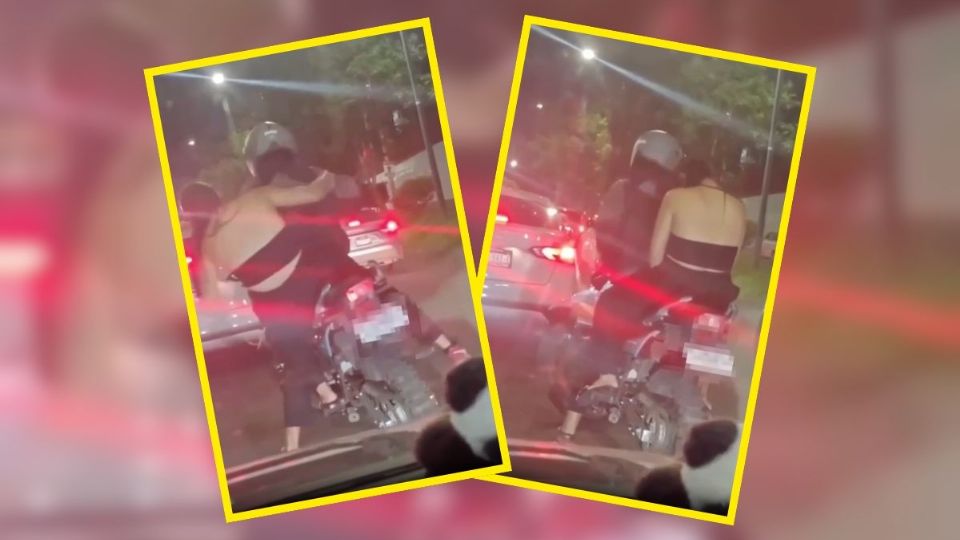 Mujer presuntamente alcoholizada cae de una moto mientras esperaba en semáforo | VIDEO