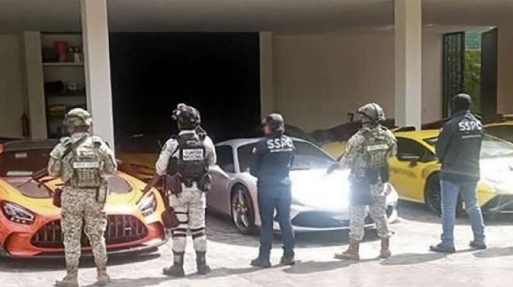 Catean mansión en Mérida y hallan 14 autos de lujo ligados a empresario asesinado