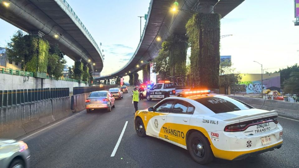 Acordonaron ese punto para evitar que los vehículos pasaran encima de los cuerpos.