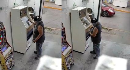 VIDEO | Con una piedra y a plena luz del día: graban robo a máquina tragamonedas