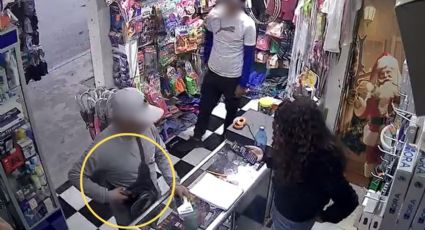 Asaltan negocio en El Carmen; delincuentes huyen con celulares