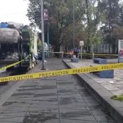 Hallan cuerpo en camión de basura en la Doctores