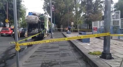 Hallan cuerpo en camión de basura en la Doctores