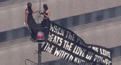 Escalan el Empire State Building y muestran una pancarta a favor de la paz